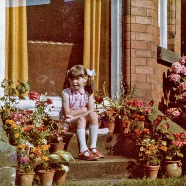 Sarah Coates as a child in her Nottinghamshire family garden